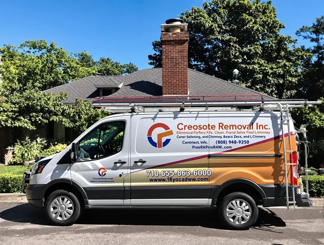 Fort Carson Chimney Sweep technician removing creosote safely in Fort Carson, CO