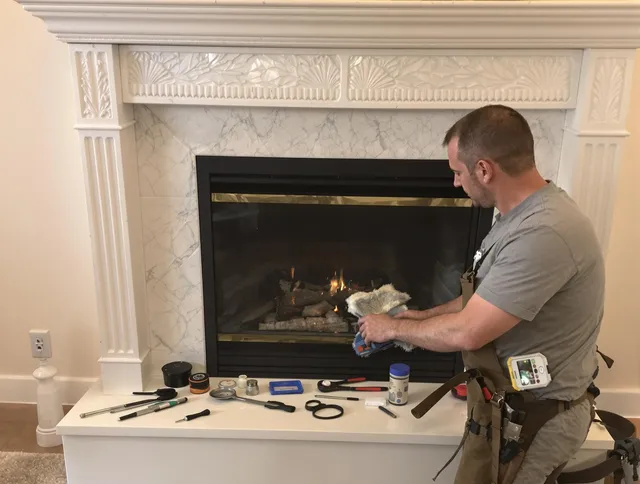 Fort Carson Chimney Sweep performing fireplace maintenance in Fort Carson, CO